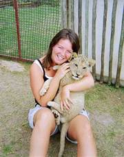 we rare and breed exotic African feline white lion cubs and tiger cubs